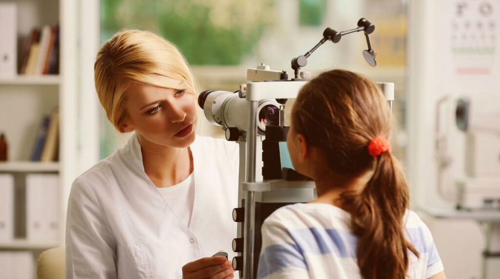 image of a female optometrist performing an eye exam on a patient. this is the featured image on global care optometry's eye care services page